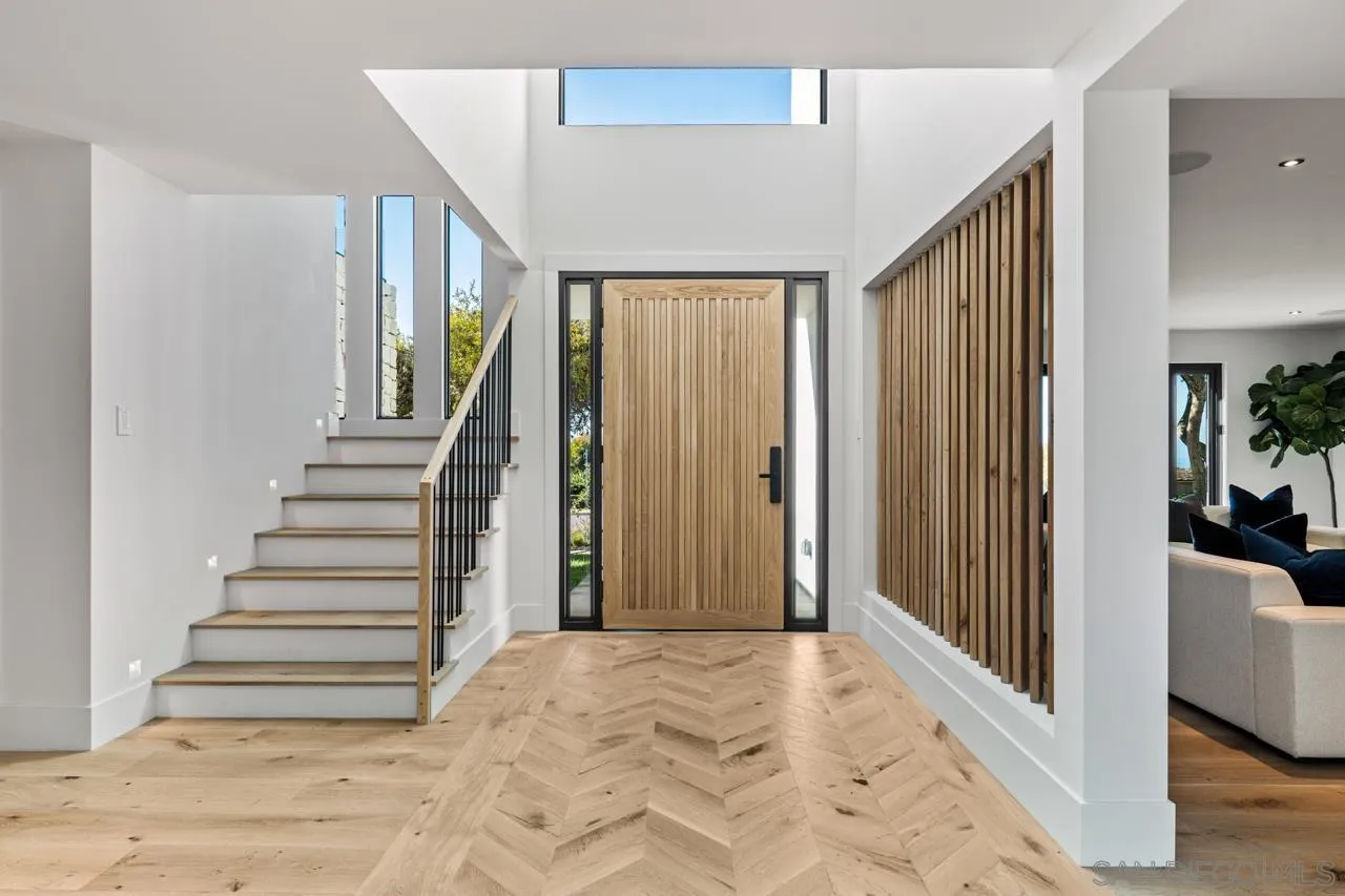 8433 Prestwick Drive La Jolla, CA 92037 - Photo 4 of 74 a view of entryway with furniture and staircase