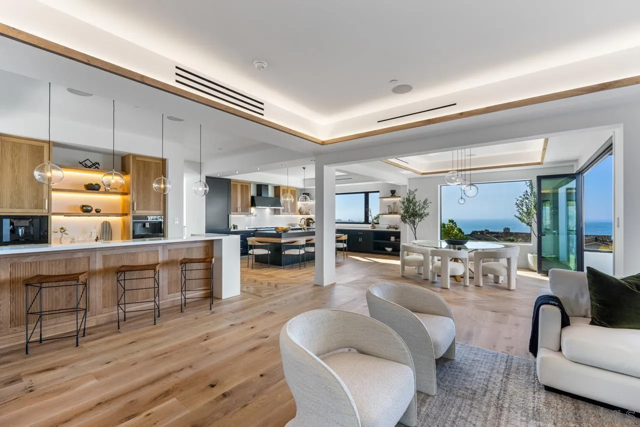 8433 Prestwick Drive La Jolla, CA 92037 - Photo 57 of 74 a living room with furniture and a large window