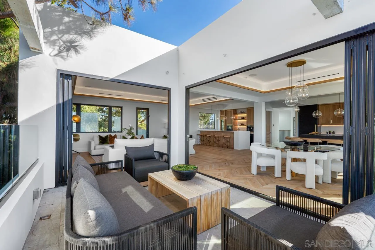 8433 Prestwick Drive La Jolla, CA 92037 - Photo 63 of 74 a living room with furniture and a flat screen tv