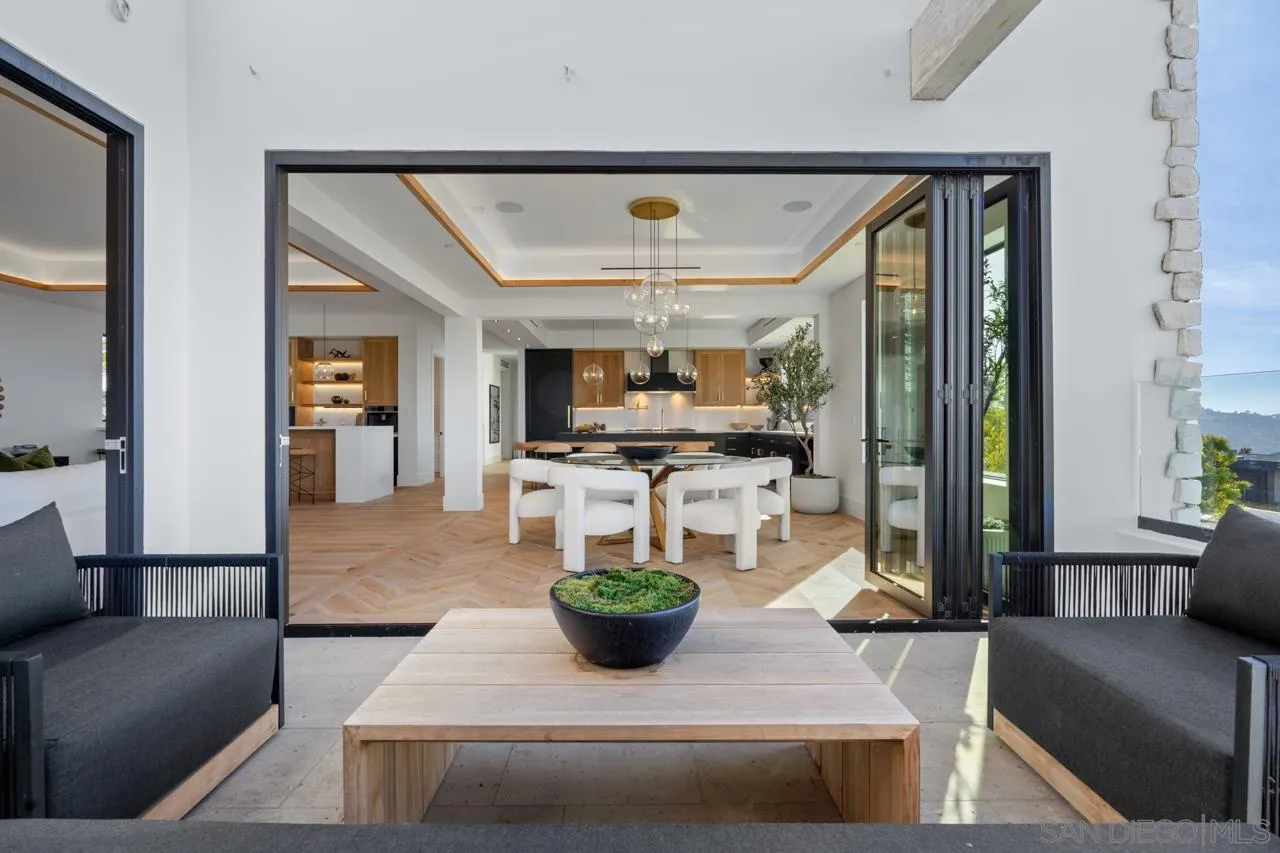 8433 Prestwick Drive La Jolla, CA 92037 - Photo 64 of 74 a living room with furniture and a flat screen tv