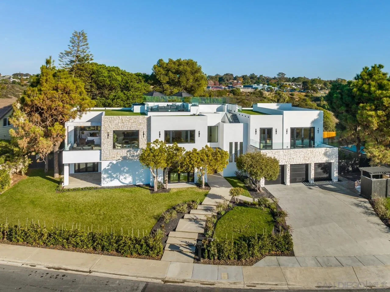 8433 Prestwick Drive La Jolla, CA 92037 - Photo 68 of 74 a front view of a house with a yard