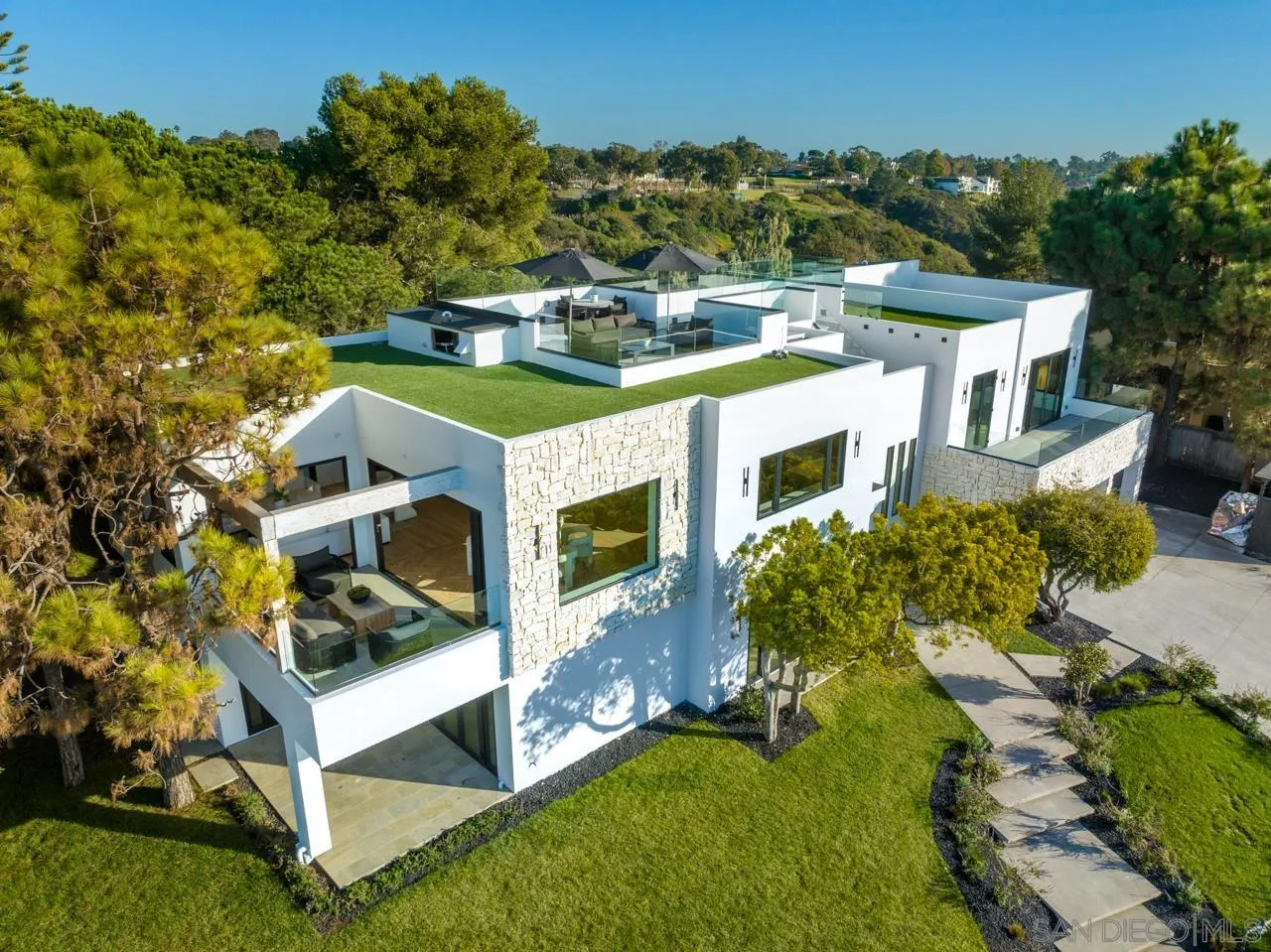 8433 Prestwick Drive La Jolla, CA 92037 - Photo 70 of 74 an aerial view of a house with a yard