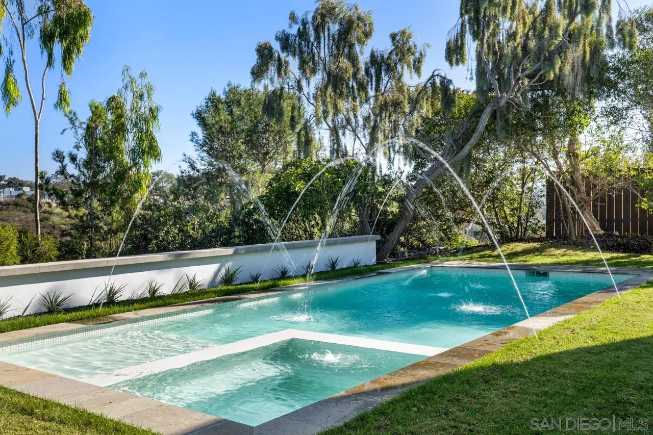 8433 Prestwick Drive La Jolla, CA 92037 - Photo 71 of 74 a view of a backyard with a large tree
