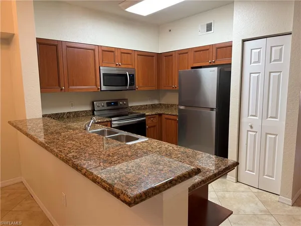 $270,000 | 20257 Royal Villagio Court, Unit 203, Estero, FL 33928