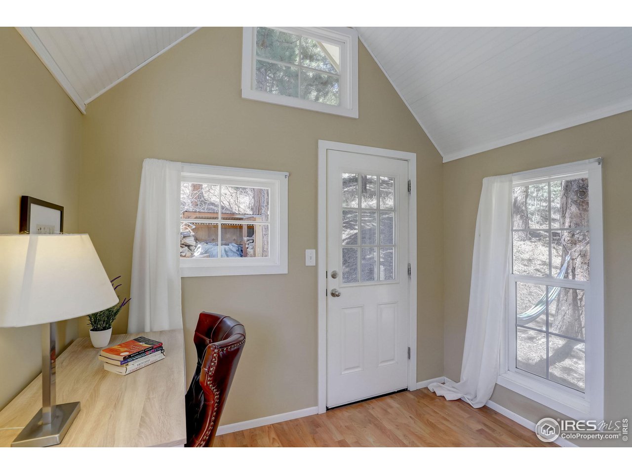 811 County Road 83 Boulder, CO 80302 - Photo 29 of 38 a view of a workspace with furniture and a window