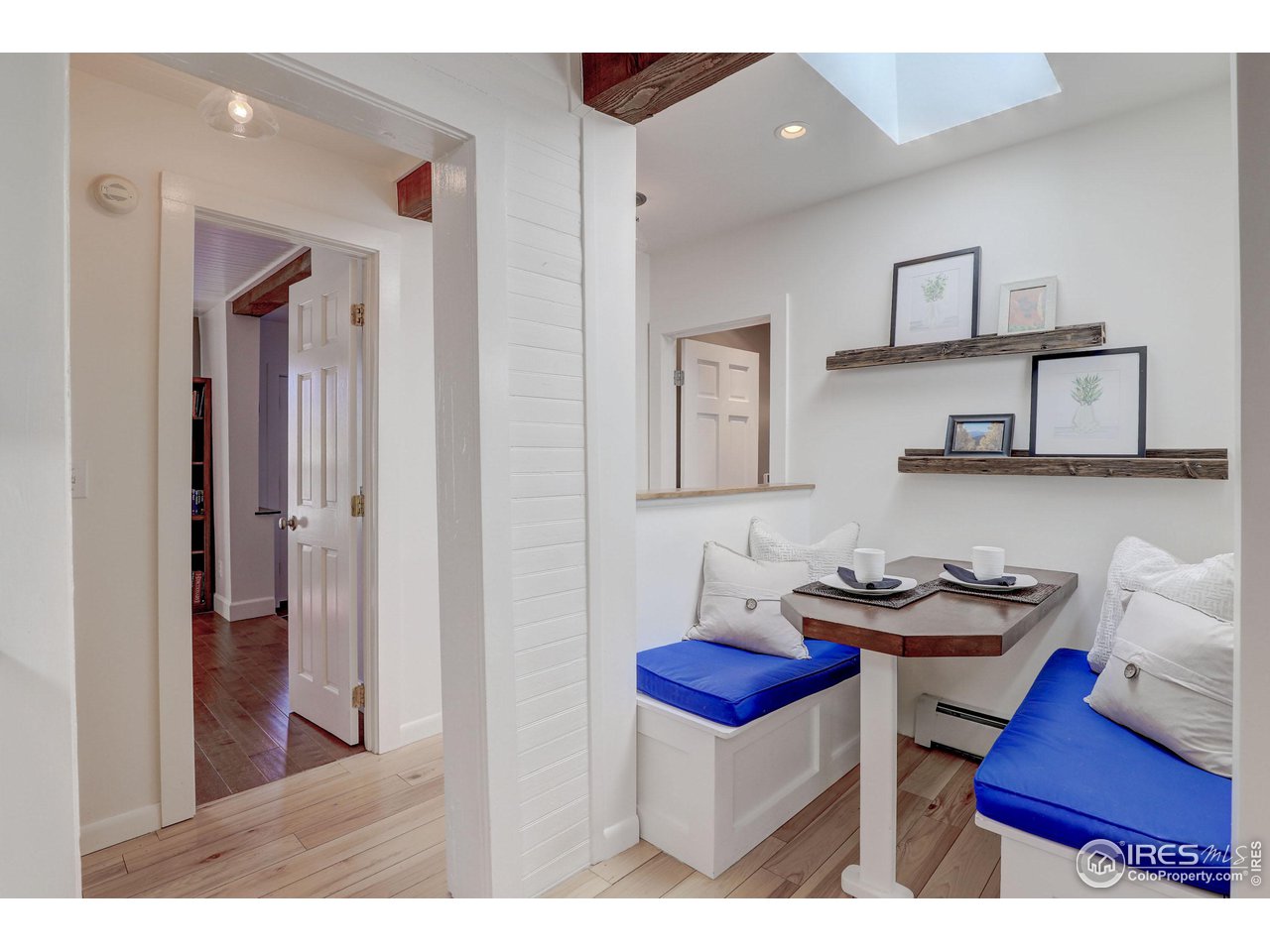 811 County Road 83 Boulder, CO 80302 - Photo 8 of 38 a dining room with furniture and wooden floor