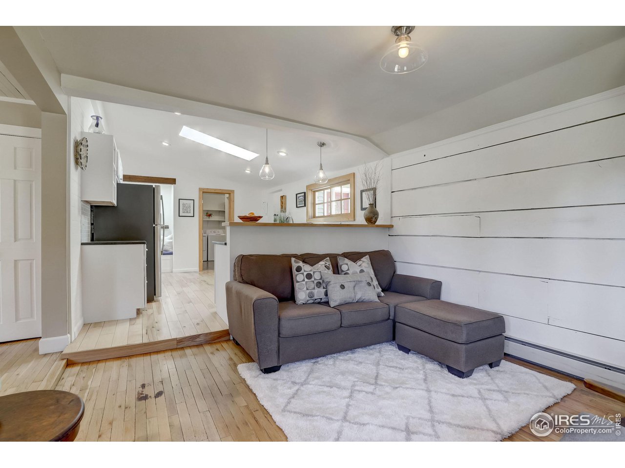 811 County Road 83 Boulder, CO 80302 - Photo 9 of 38 a living room with furniture and a wooden floor