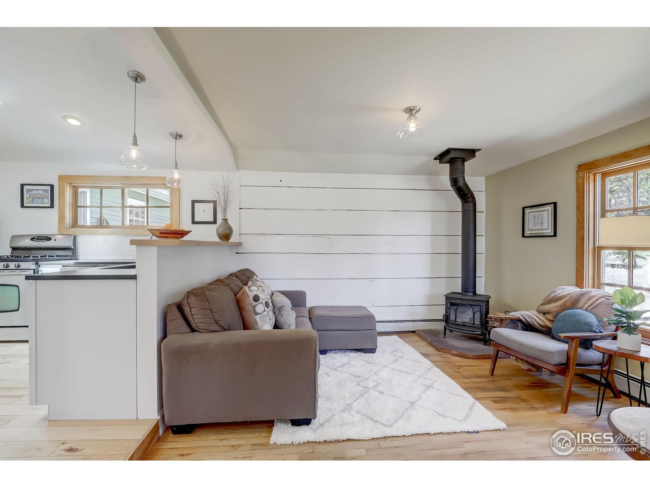 811 County Road 83 Boulder, CO 80302 - Photo 10 of 38 a living room with furniture and kitchen view