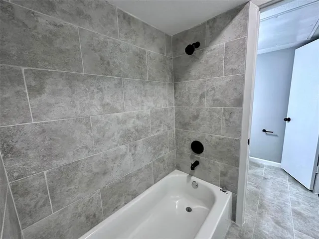 a bathroom with a bathtub