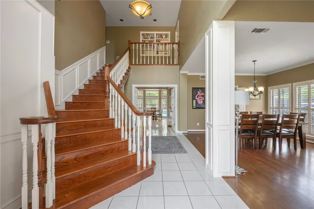 a view of front door and dining room