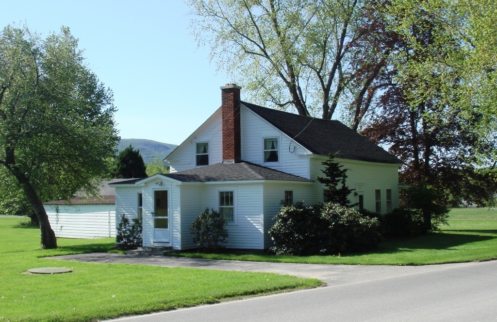 404 Middle Road Clarksburg, MA 01247 - Photo 1 of 16 a front view of a house with a yard