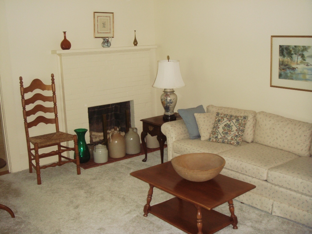 404 Middle Road Clarksburg, MA 01247 - Photo 2 of 16 a living room with furniture and a fireplace