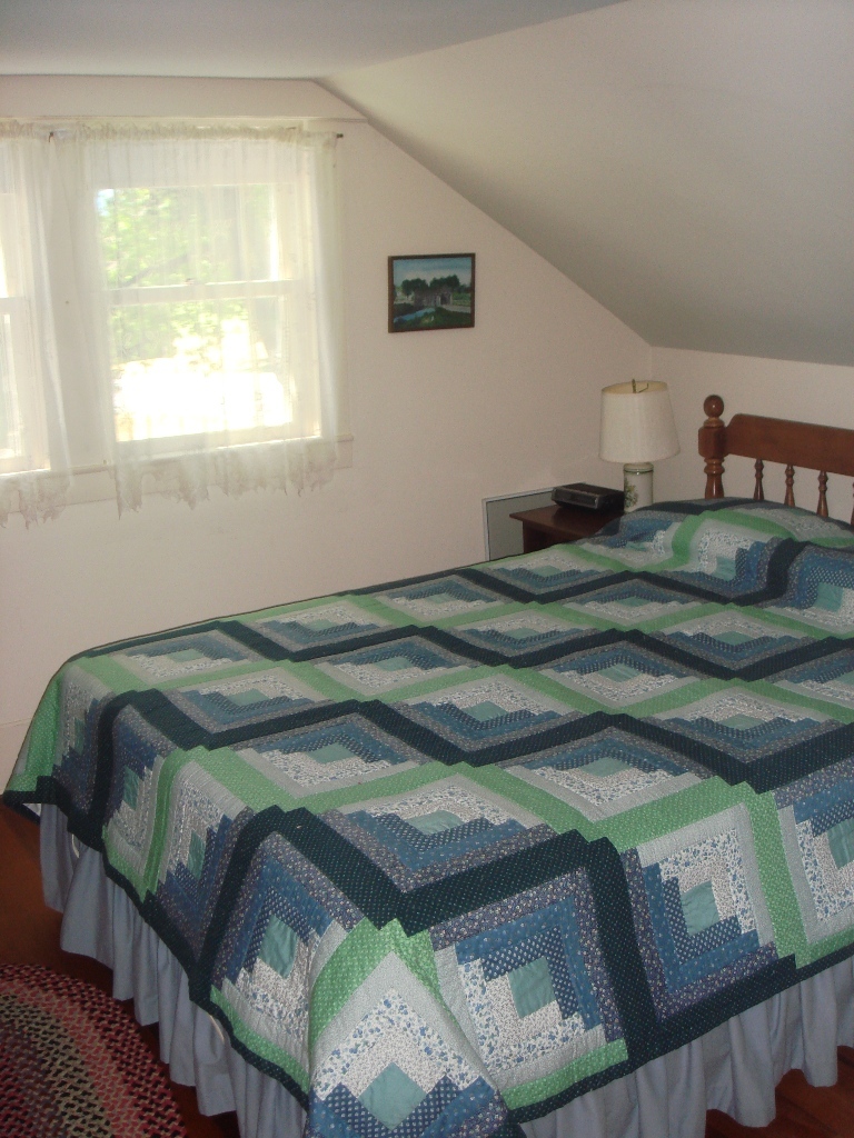404 Middle Road Clarksburg, MA 01247 - Photo 12 of 16 a bedroom with a bed and window