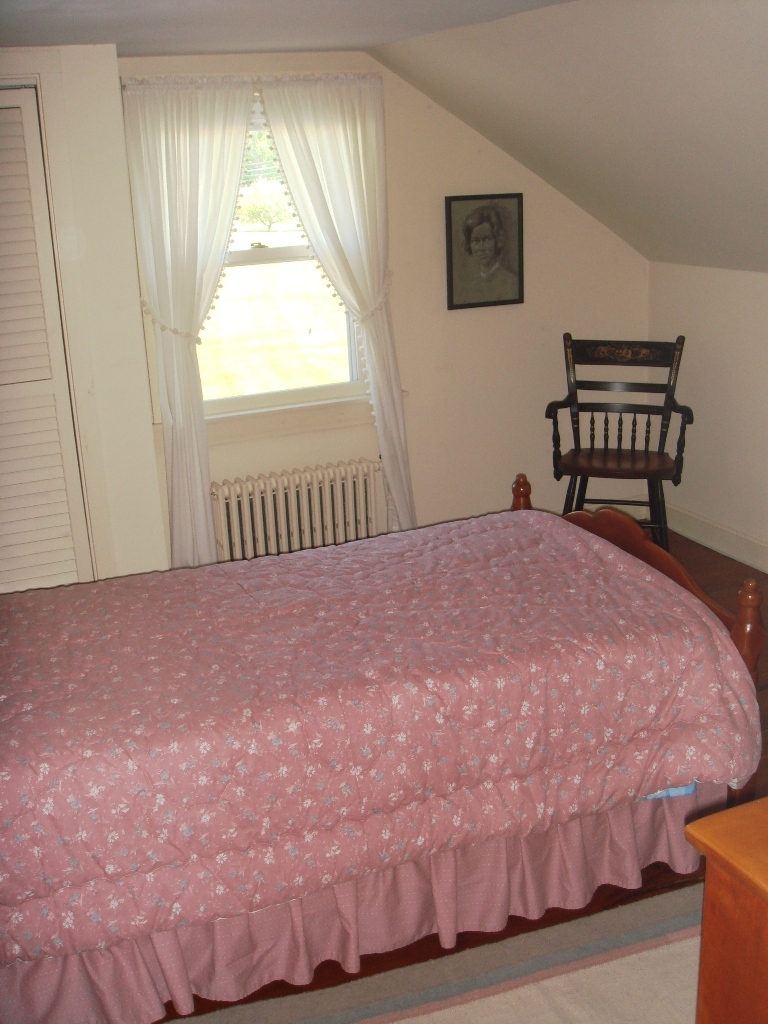 404 Middle Road Clarksburg, MA 01247 - Photo 14 of 16 a bedroom with a bed and a window