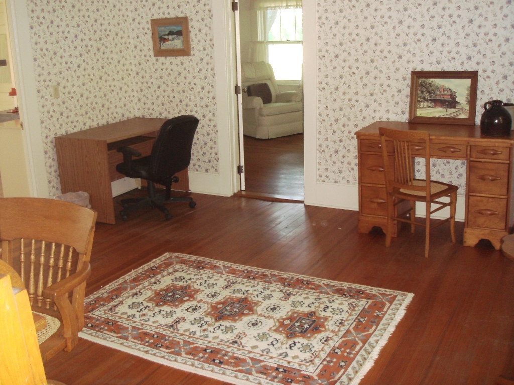 404 Middle Road Clarksburg, MA 01247 - Photo 7 of 16 a living room with furniture rug and a table