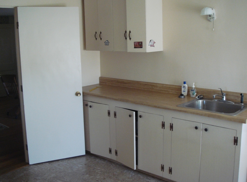 404 Middle Road Clarksburg, MA 01247 - Photo 8 of 16 a room with granite countertop white cabinets and sink