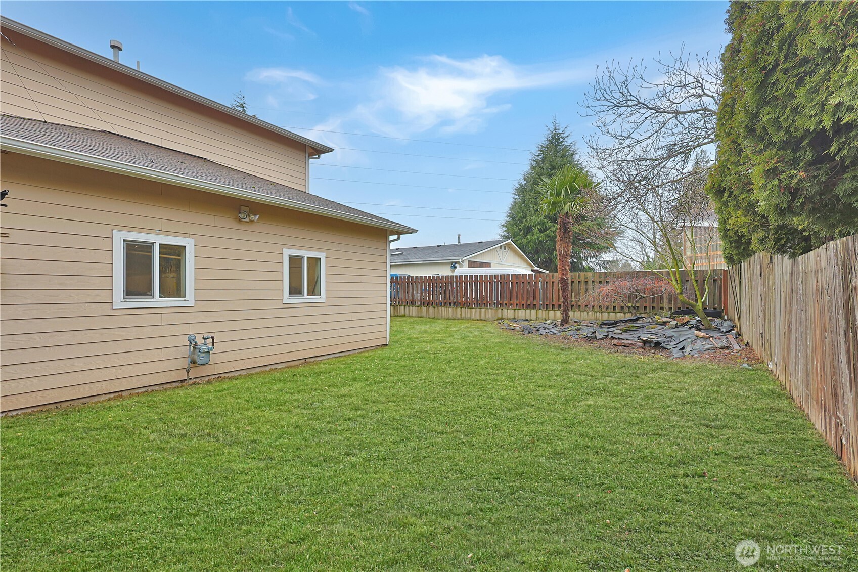 11107 Southeast 162nd Street, Unit B Renton, WA 98055 - Photo 15 of 15 a view of a backyard with a garden