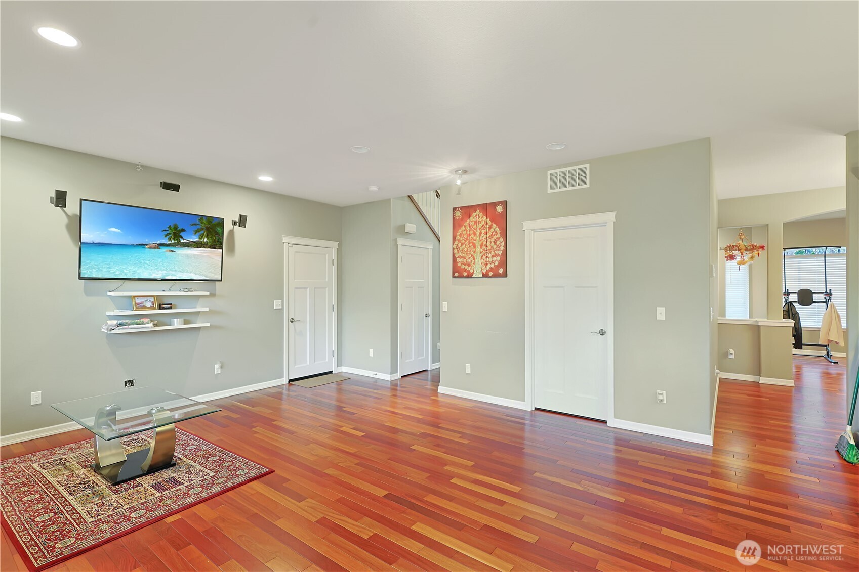 11107 Southeast 162nd Street, Unit B Renton, WA 98055 - Photo 4 of 15 a view of an empty room and wooden floor