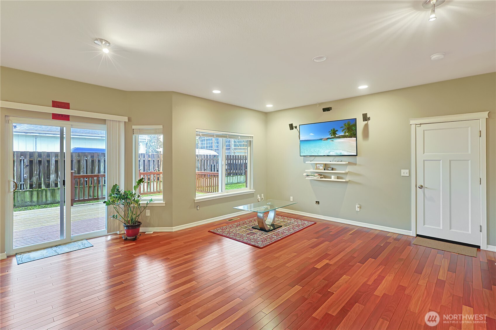 11107 Southeast 162nd Street, Unit B Renton, WA 98055 - Photo 5 of 15 a view of livingroom with hardwood floor and a ceiling fan
