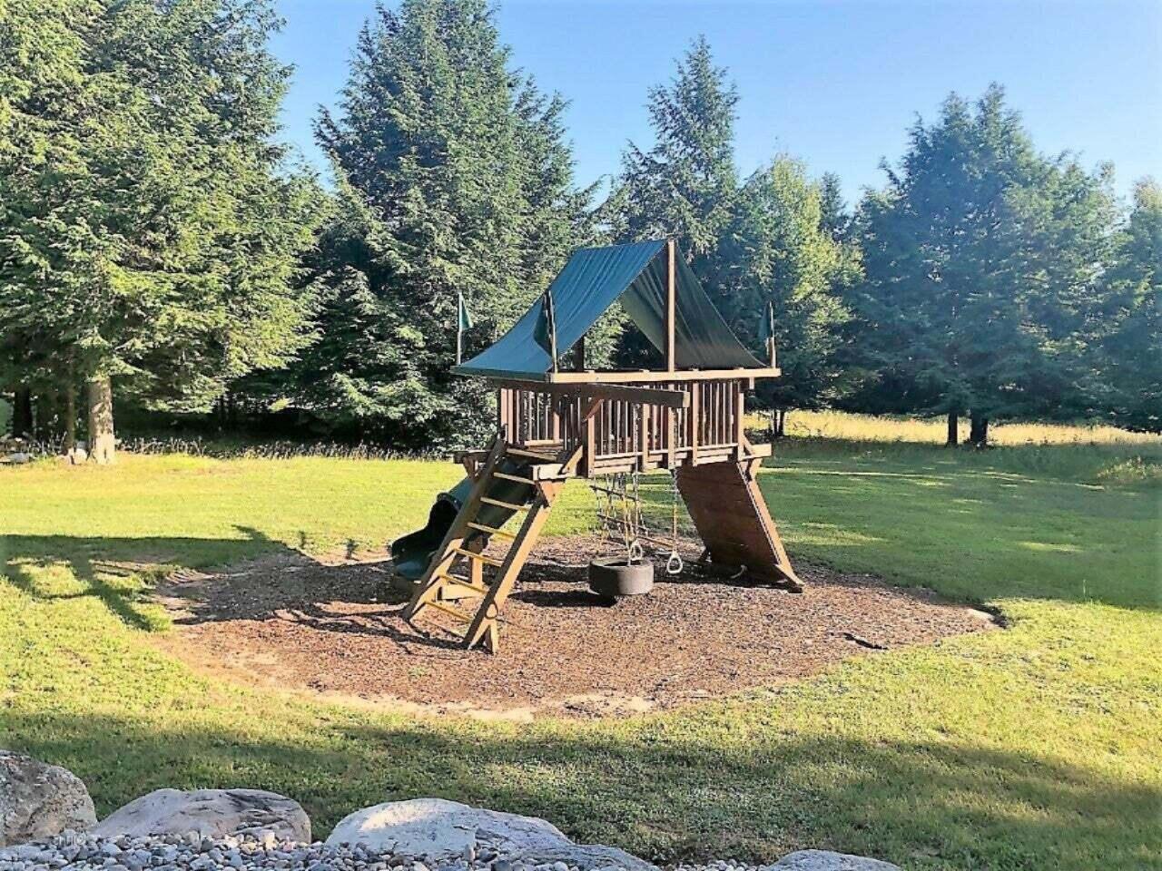 West Starlight Rdg Circle, Unit 62 Onekama, MI 49675 - Photo 11 of 13 playground equip