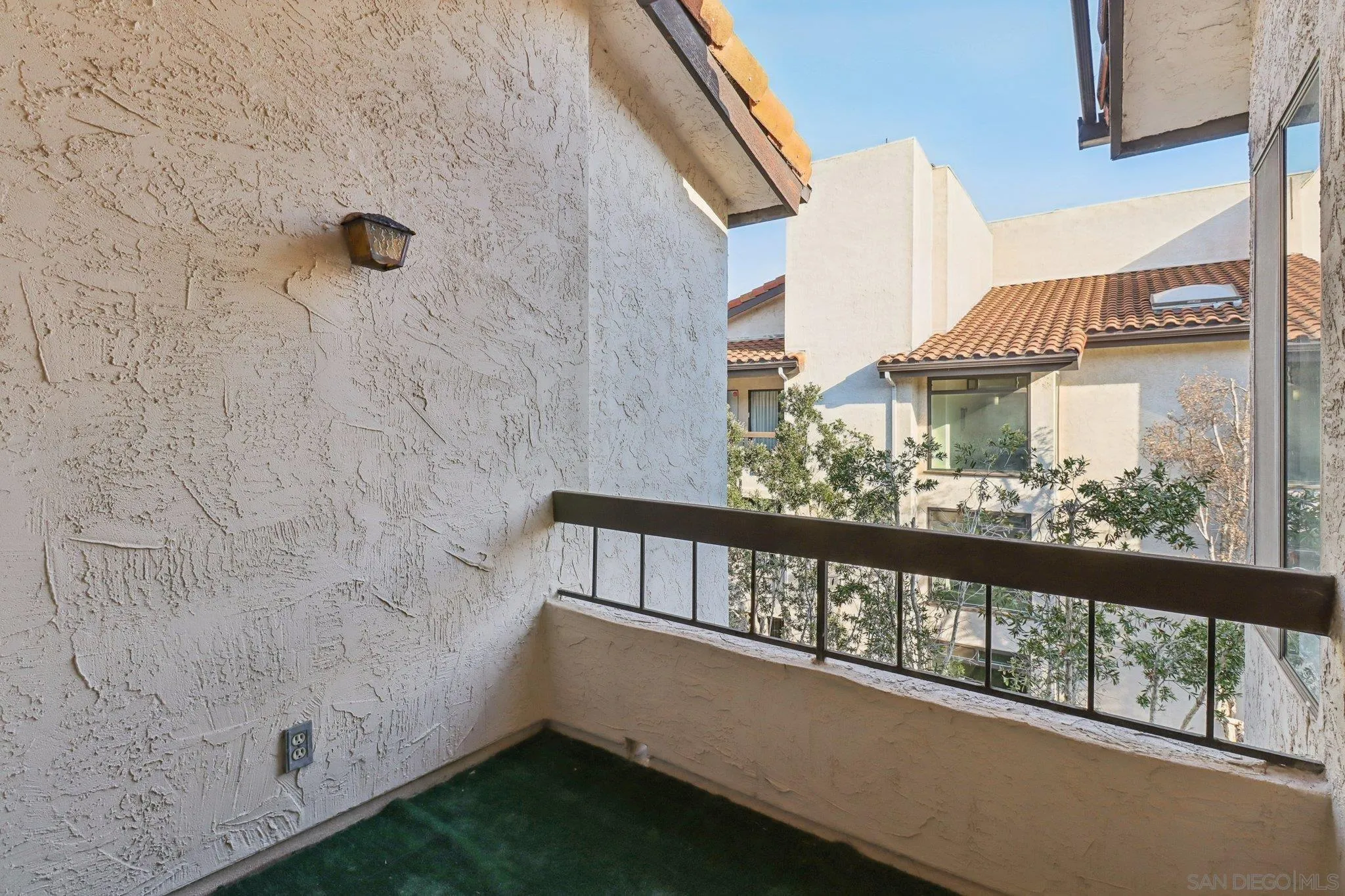 5645 Friars Road, Unit 386 San Diego, CA 92110 - Photo 21 of 72 a view of a balcony with an outdoor space