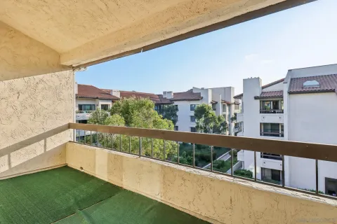 a view of terrace with seating area and roof