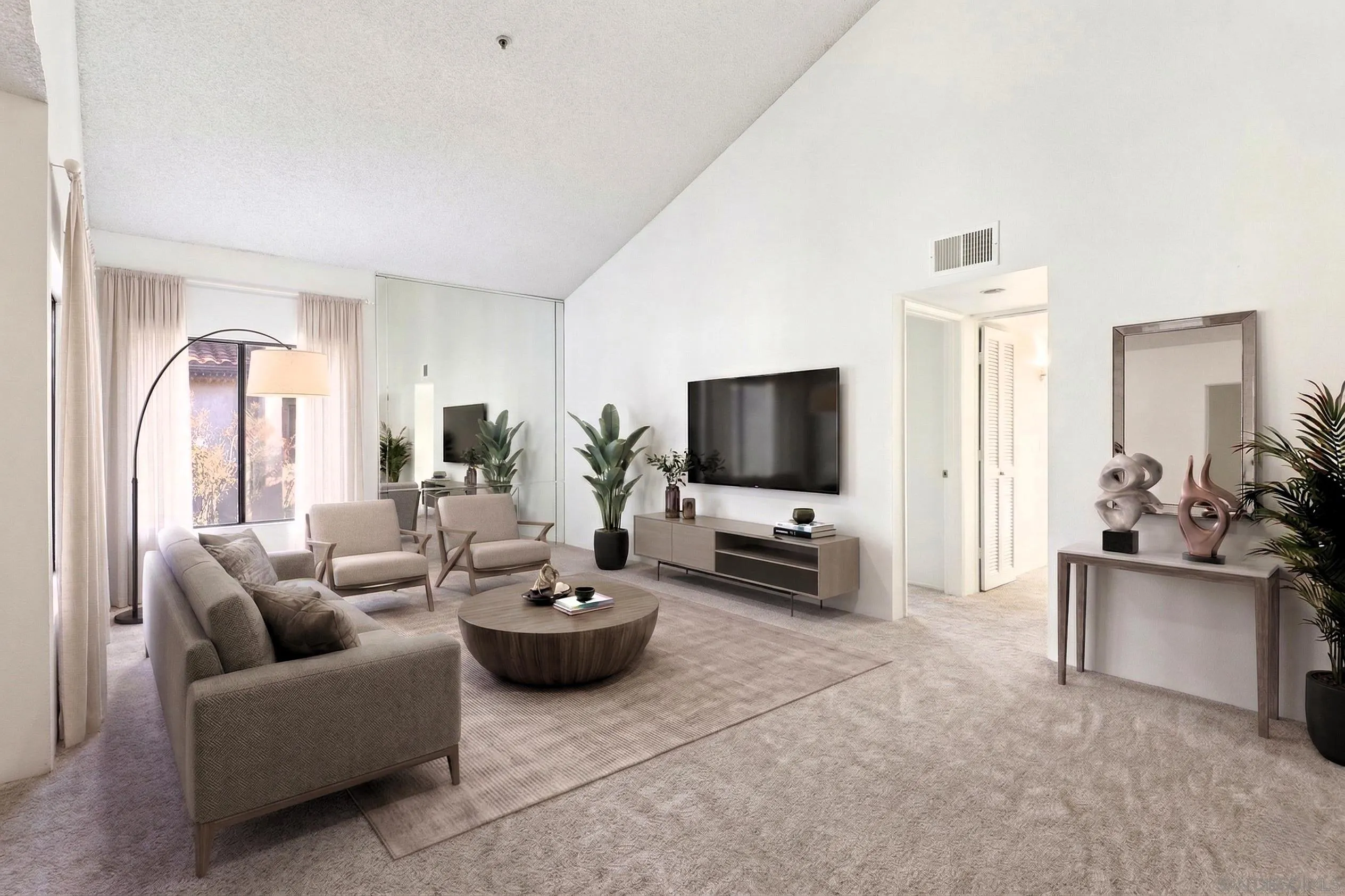 5645 Friars Road, Unit 386 San Diego, CA 92110 - Photo 4 of 72 a living room with furniture and a flat screen tv