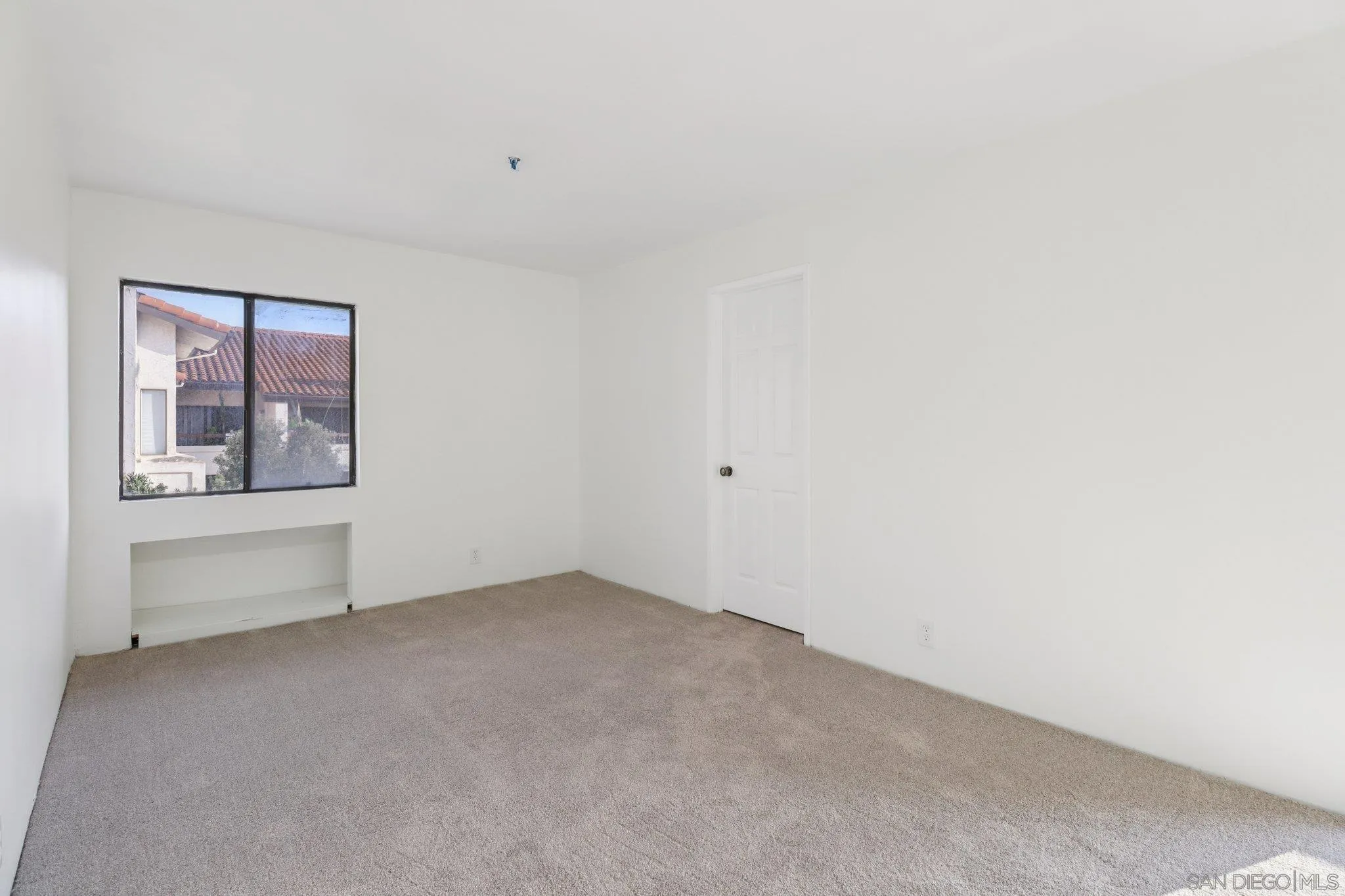 5645 Friars Road, Unit 386 San Diego, CA 92110 - Photo 41 of 72 a view of an empty room with a window