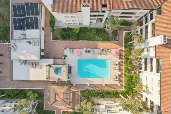 an aerial view of residential building and lake view
