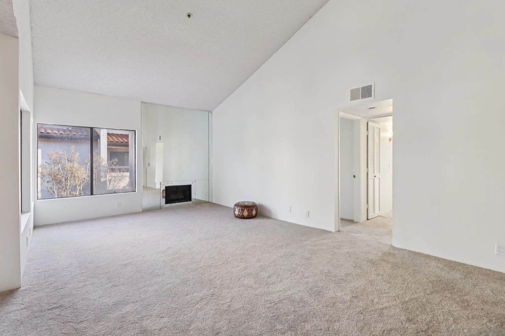 5645 Friars Road, Unit 386 San Diego, CA 92110 - Photo 5 of 72 a view of an empty room with a window