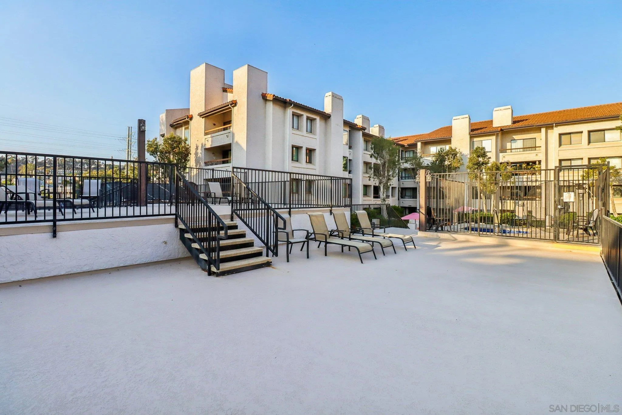 5645 Friars Road, Unit 386 San Diego, CA 92110 - Photo 52 of 72 a view of terrace with seating area and roof