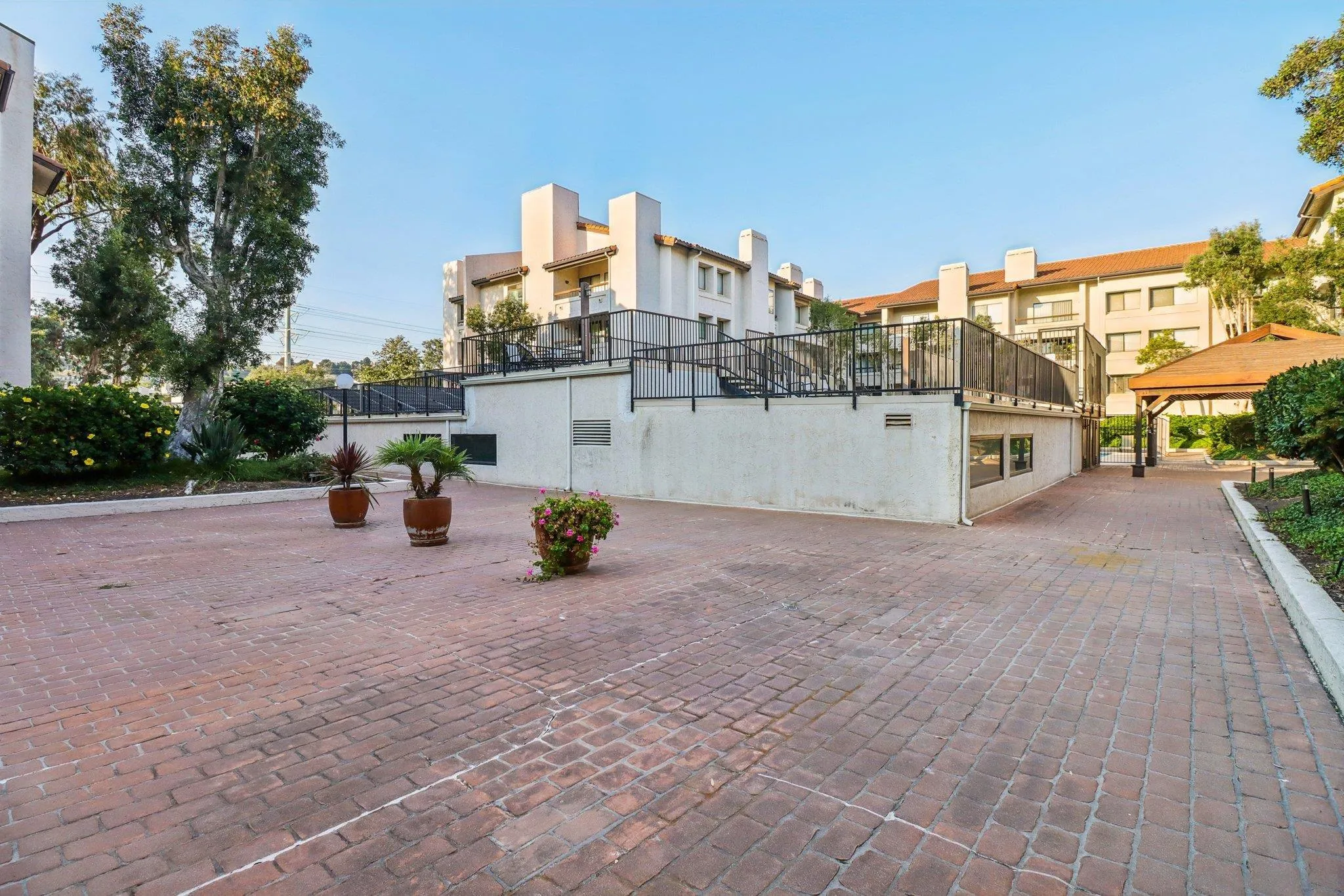 5645 Friars Road, Unit 386 San Diego, CA 92110 - Photo 55 of 72 a view of roof deck with a barbeque and wooden stairs