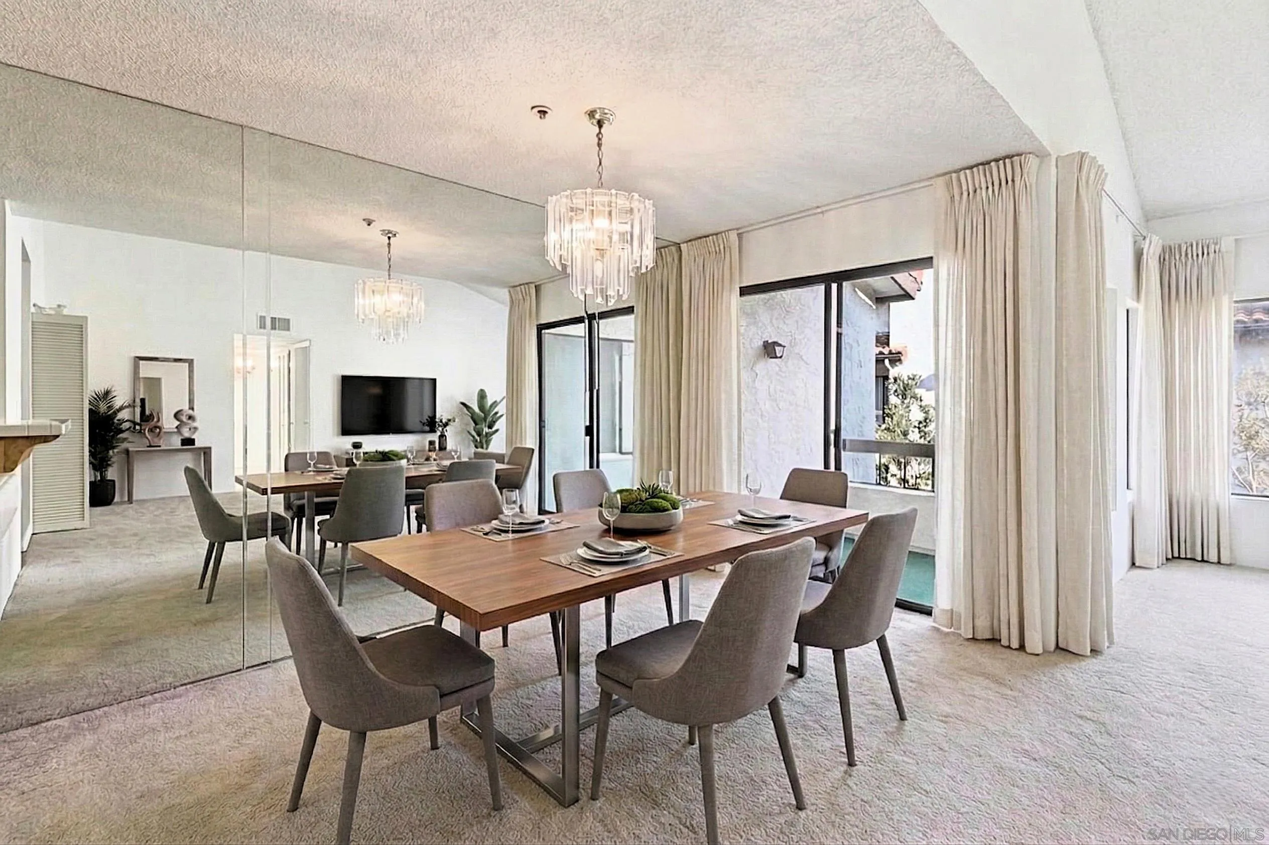 5645 Friars Road, Unit 386 San Diego, CA 92110 - Photo 6 of 72 a view of a dining room with furniture window and wooden floor