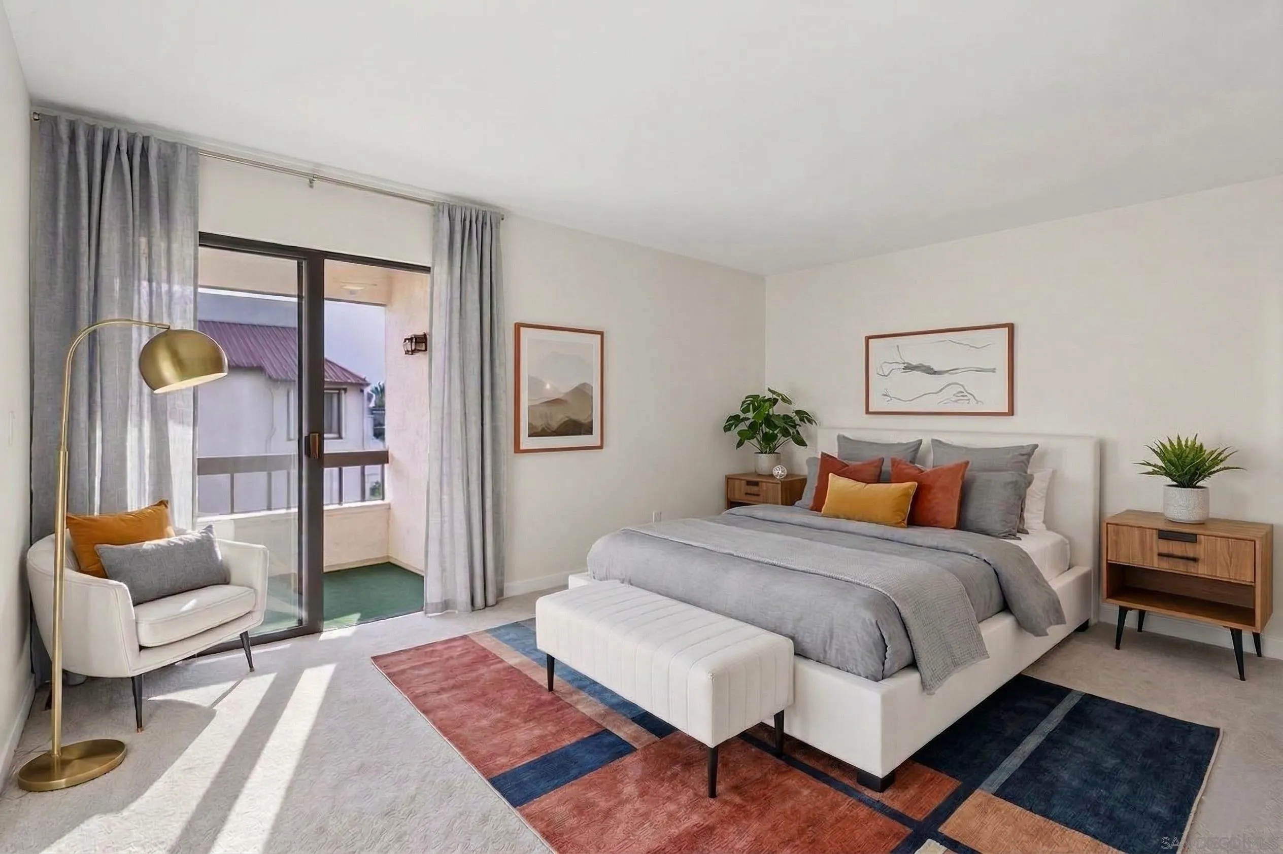 5645 Friars Road, Unit 386 San Diego, CA 92110 - Photo 10 of 72 a bedroom with a bed and a couch