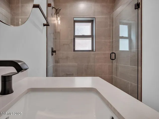 a view of a wooden deck with furniture