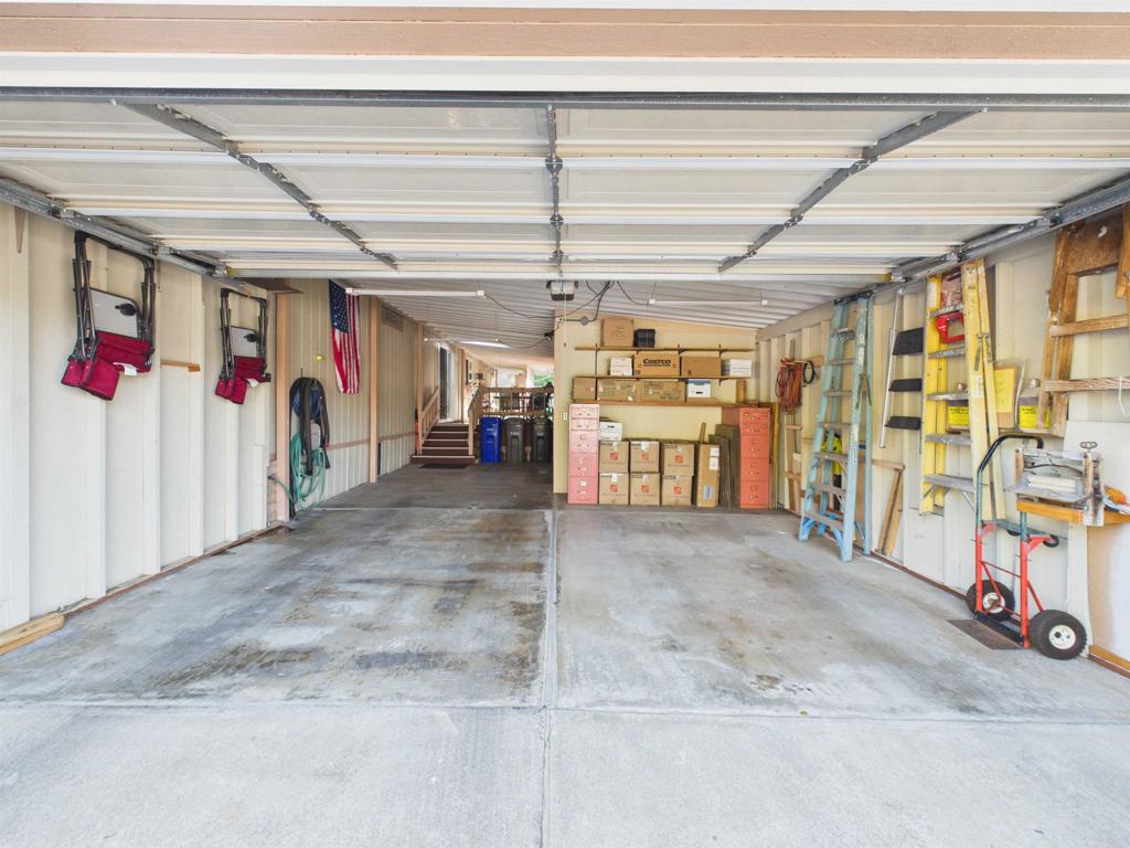 18218 Paradise Mountain Road, Unit 220 Valley Center, CA 92082 - Photo 43 of 48 a view of a garage
