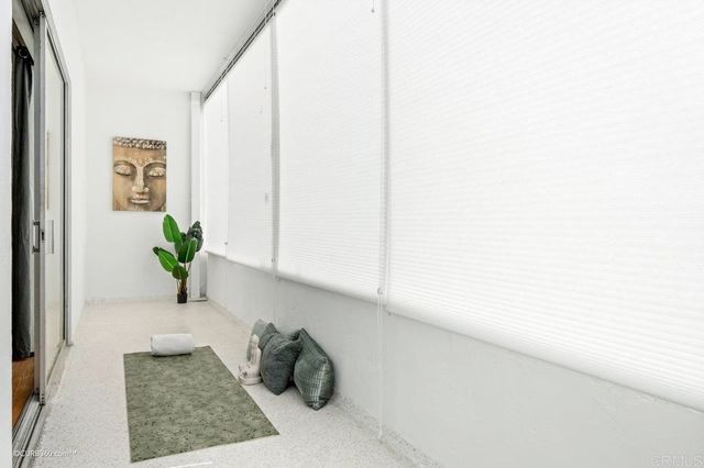 a white bath tub sitting in a bathroom