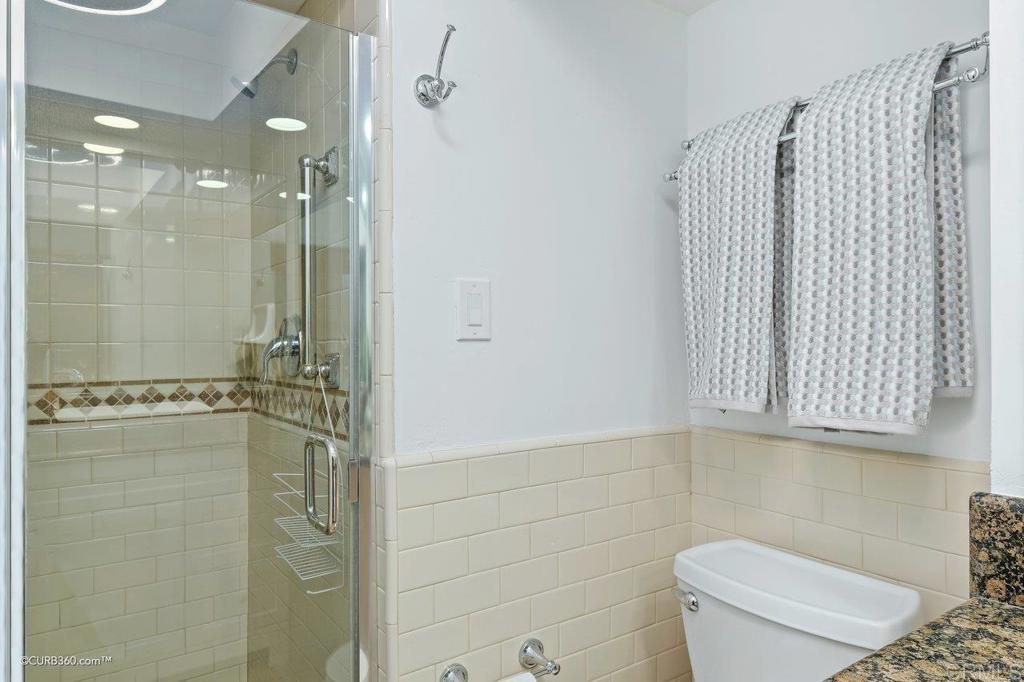 2352 Torrey Pines Road, Unit 1 La Jolla, CA 92037 - Photo 19 of 37 a bathroom with a shower a toilet and a sink