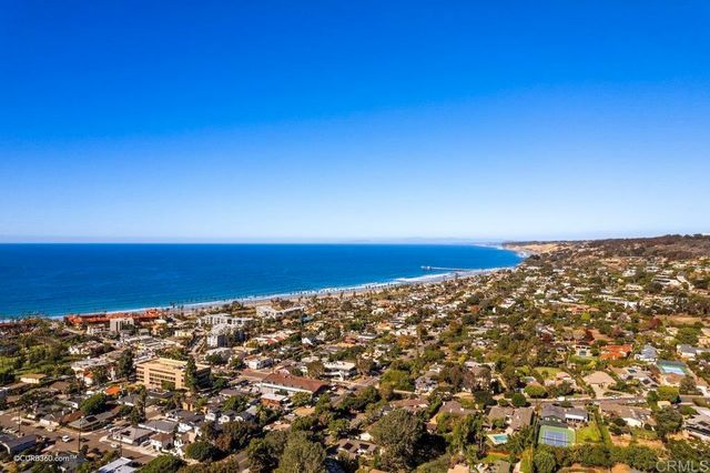 a view of a large building with a ocean view