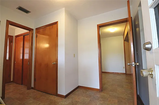 an empty room and closet