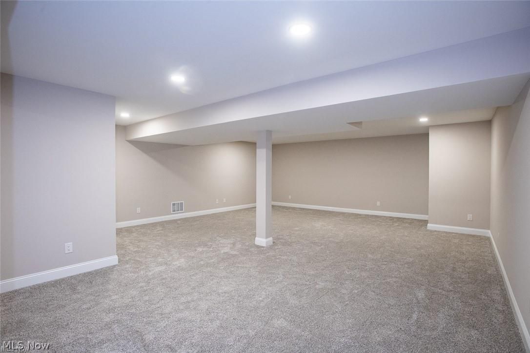 34286 Brookside Lane North Ridgeville, OH 44039 - Photo 45 of 50 Finished basement with light colored carpet and recessed lighting