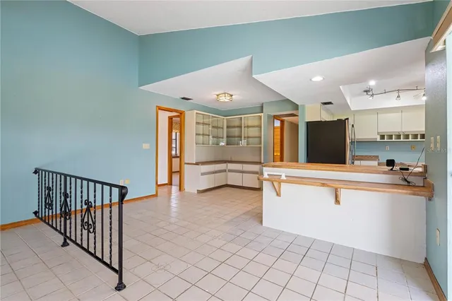 a bathroom with a sink a mirror and a shower
