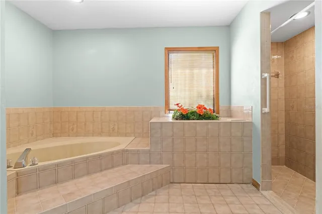 a view of indoor pool and sitting area