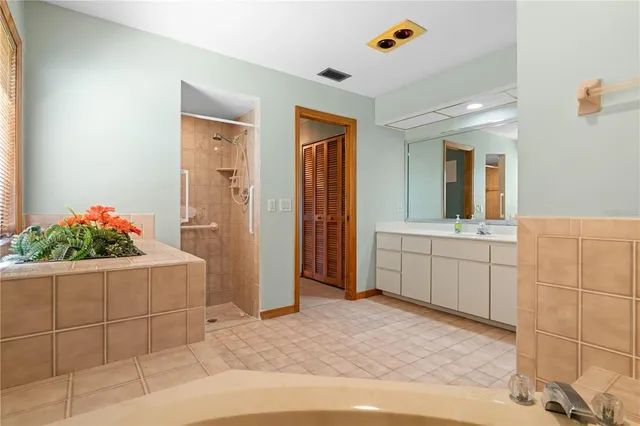 a view of a backyard with a swimming pool