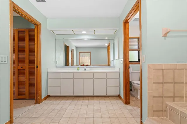 an aerial view of a houses with outdoor space and street view