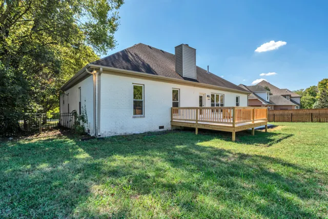 a house view with a garden space