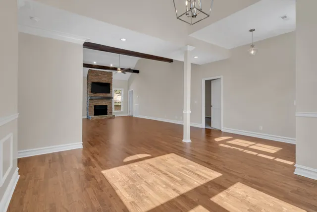 a view of a livingroom with wooden floor