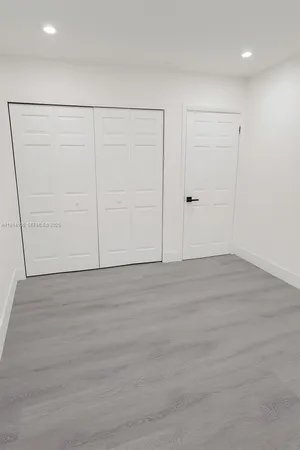 an empty room with closet