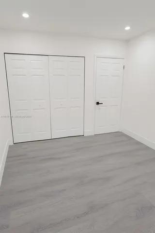 an empty room with closet