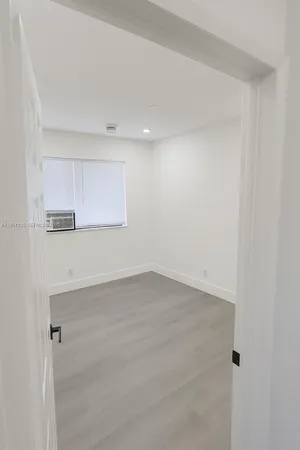 a view of a kitchen with a sink